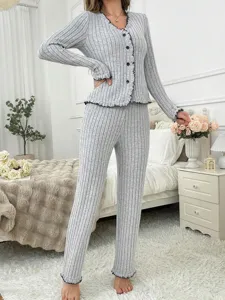 Grey ribbed knit pajama set for women featuring long sleeve cardigan and matching pants.