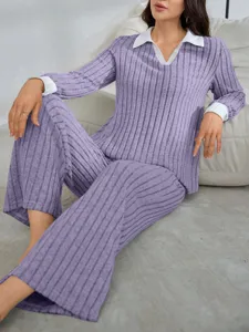 Close-up detail of women's purple ribbed long sleeve loungewear set with white collar.