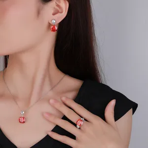 Close-up detail shot of the elegant red gemstone jewelry set featuring necklace and ring.
