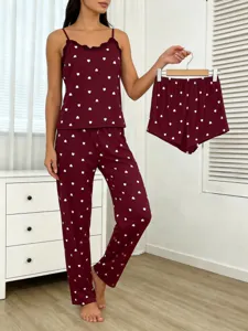 Detailed view of women's 3-piece pajama set featuring lace camisole, pants and shorts.