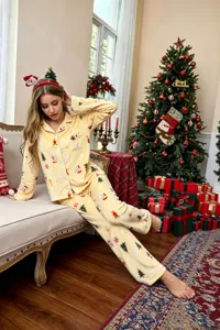 Christmas printed long sleeve pajama set for women, cozy yellow loungewear for holiday winter.