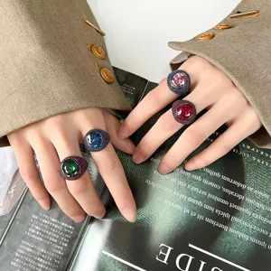 Gorgeous crystal statement cocktail ring set featuring vibrant oval colored stones with pave bands.