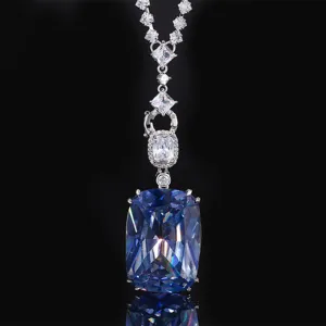 Luxurious blue cushion cut synthetic gemstone pendant necklace with dazzling cubic zirconia details.