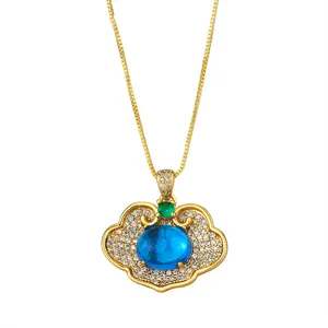 Gold-plated Ruyi lock necklace with blue and green gems and sparkling zircon stones.