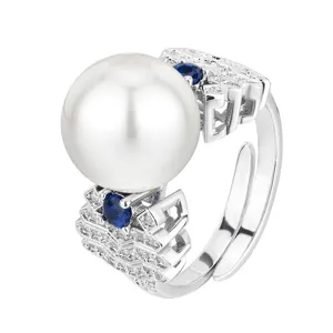 Elegant silver-tone open ring featuring a large white pearl, blue stones and sparkling diamonds.