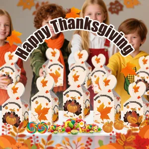 Thanksgiving candy box detail showing turkey and pumpkin patterns, ideal for holiday party.