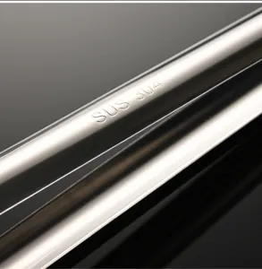 Stainless steel ice tong detail showing SUS 304 material mark, durable polished kitchen tool.