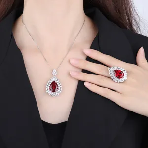 Detailed shot of copper gold plated red cubic zirconia pear necklace ring jewelry set