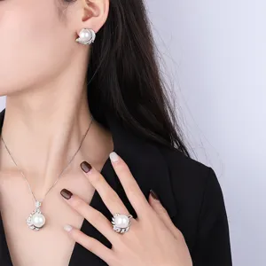 Korean style pearl jewelry set featuring earrings necklace and ring with elegant leaf design.