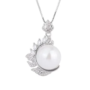 Silver pearl feather pendant necklace detail view, elegant white gemstone jewelry piece.