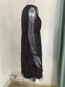 Elegant black v-neck mesh spliced glitter midi dress for women, stylish party wear apparel.
