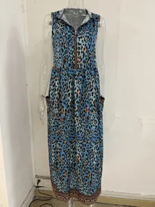 Detail view of the blue leopard print sleeveless hooded dress featuring a front zipper and pockets.