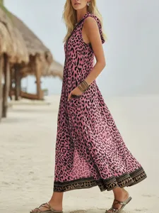 Pink leopard print sleeveless hooded maxi dress with pockets for beach resort vacation.