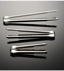 Stainless steel ice tong detail shot showing high quality 304 material and anti-slip grip.