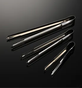 Stainless steel ice tongs detail shot, 304 material, non-slip serrated food clip for kitchen.