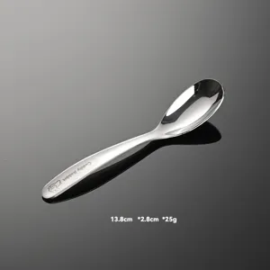 316 stainless steel baby feeding spoon with cute rabbit engraving, detailed view of infant tableware.