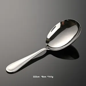 Cucchiaio da portata in acciaio inox con manico perlato, elegante design ovale.