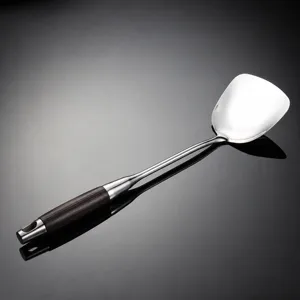 Stainless steel spatula handle detail closeup, durable kitchen cooking tool showcase.