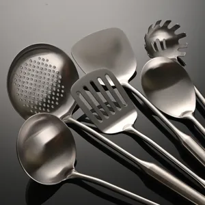 Stainless steel kitchen utensils set, premium cooking tools including ladle and turner.