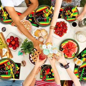 Juneteenth party tableware set scene detail showing colorful theme paper plates and napkins.