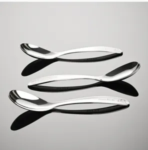 Stainless steel baby feeding spoons set, safe toddler cutlery with cute animal designs for daily use.