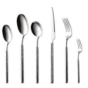 Stainless steel flatware set with hammered handle, elegant tableware kitchen knife and fork spoons.