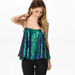 Close-up view of the shimmering green sequin camisole detail showing sparkle texture and straps.