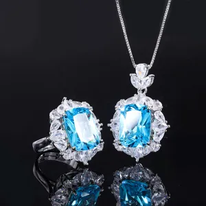 Conjunto de colgante y anillo de topacio azul simulado vintage con circonitas cúbicas.
