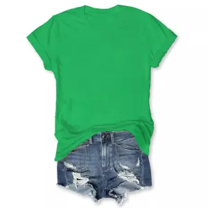 Vibrant green short sleeve t-shirt paired with blue distressed denim shorts for casual wear.