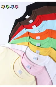 Detail view of colorful pure cotton kids short sleeve t-shirts, size 130 stack display.