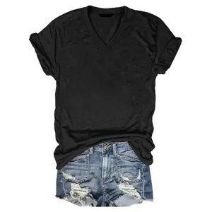 Women solid color V-neck short sleeve t-shirt paired with distressed denim shorts casual