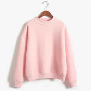 Gedetailleerd overzicht van de effen roze sweatshirttrui met zachte stof en geribbelde zoom.