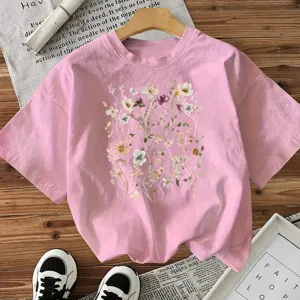 Casual pink short sleeve t-shirt for women featuring a beautiful wild botanical floral print graphic.