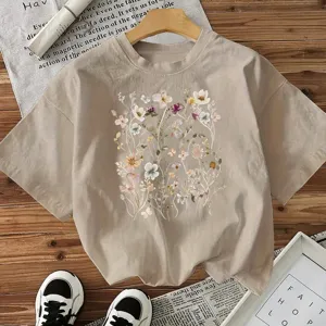 Casual beige short sleeve t-shirt for women featuring delicate botanical floral print aesthetic.