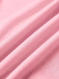 Pink casual short sleeve top fabric texture close-up, comfortable soft breathable material.