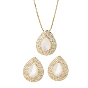 Set di gioielli con collana con ciondolo a goccia in madreperla bianca e orecchini a lobo