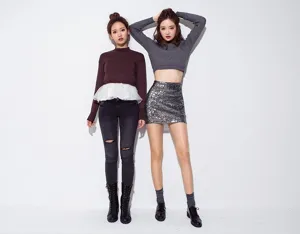 Detailed view of women's sparkling sequin bodycon skirt and stylish crop top outfit match.