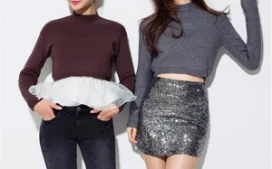 Detail view of stylish sequin bodycon skirt paired with cozy knit sweaters, party wear.