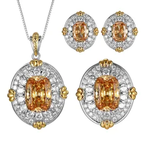 Parure de bijoux élégante en cuivre doré avec pierre zircone taille coussin champagne.