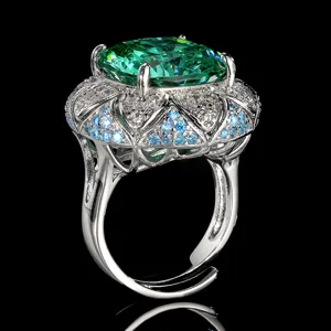 Exquisite vintage green gemstone cocktail ring with ornate multi-color pavé cubic zirconias