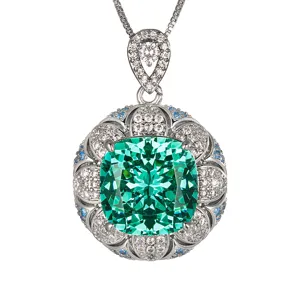 Exquisite vintage style pendant necklace featuring a stunning cushion-cut green simulated gemstone.