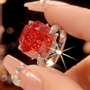 Stunning close-up detail of a large red millennium-cut gemstone ring with brilliant sparkle.