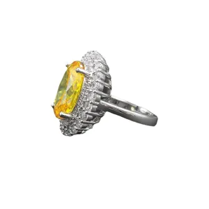 Deslumbrante anillo ovalado de circonita amarilla con halo, joya ajustable de plata elegante.
