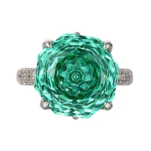 Stunning millennium cut paraiba green gemstone ring with paved band in white gold plated copper.
