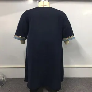 Detailed view of the navy blue long robe showcasing exquisite embroidered cuffs and a loose fit.