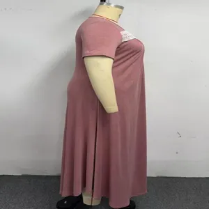 Plus size casual dress detail showing short sleeves, square neckline and lace trim design.