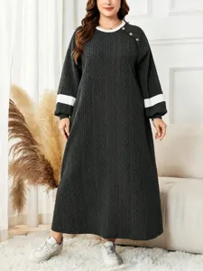 Detail view of Plus size cable knit long sleeve maxi dress with contrast collar and cuffs.