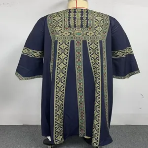 Detail view of ethnic print back design, loose dark blue plus size long robe garment features.