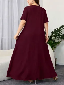 Plus size dark red textured short sleeve maxi dress detail view, casual relaxed fit.