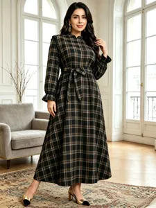 Detailed view of the vintage plaid long sleeve maxi dress showcasing waist belt and high neck.